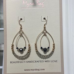 Gold and gray pair of earrings